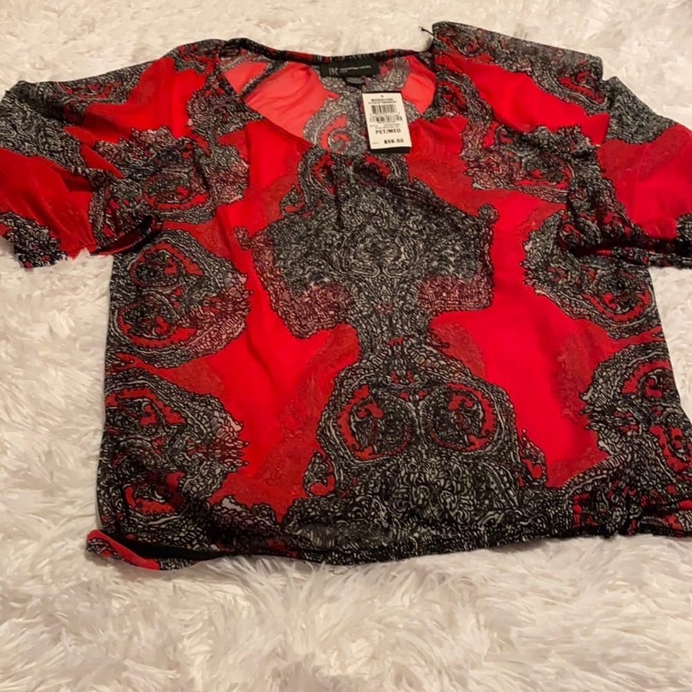 Sheer red & black top.